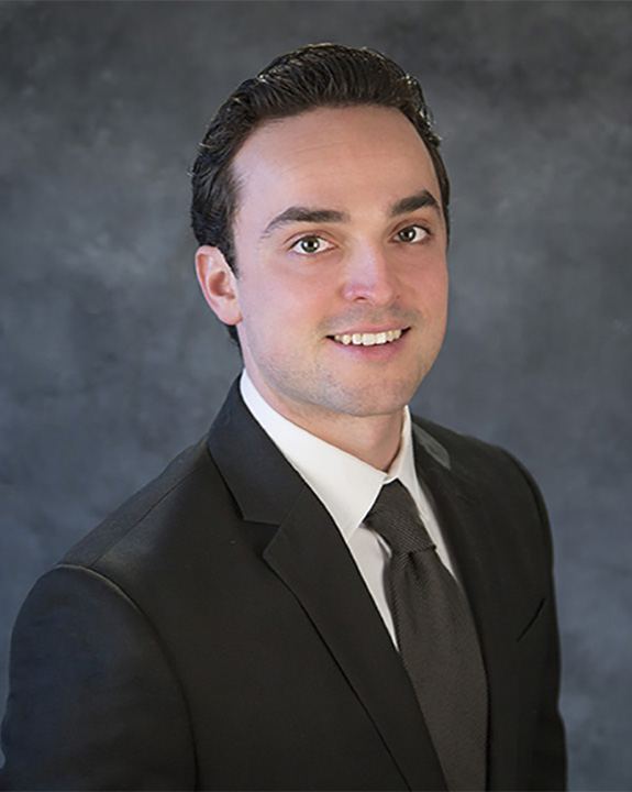 Professional headshot of a man